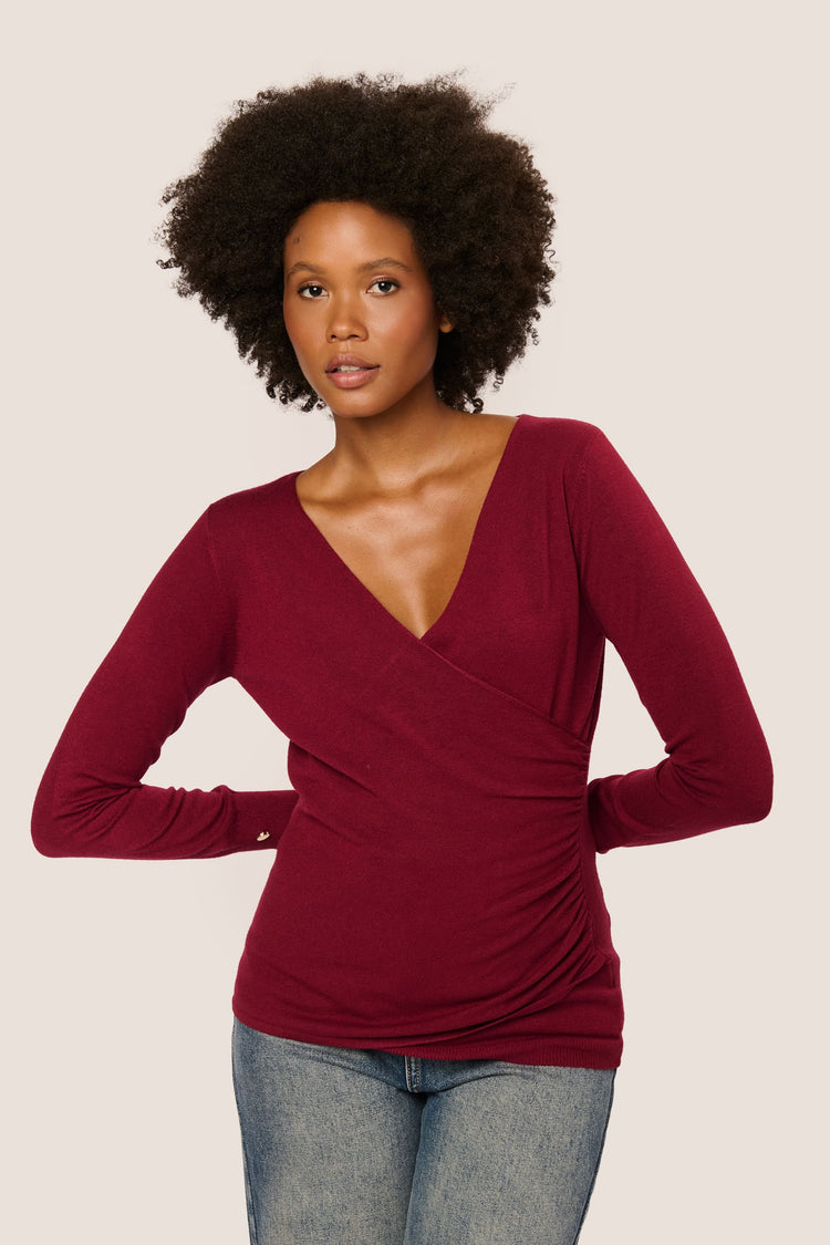 Pull incrociato con bottoni