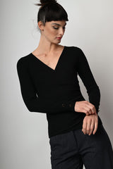Pull con design incrociato