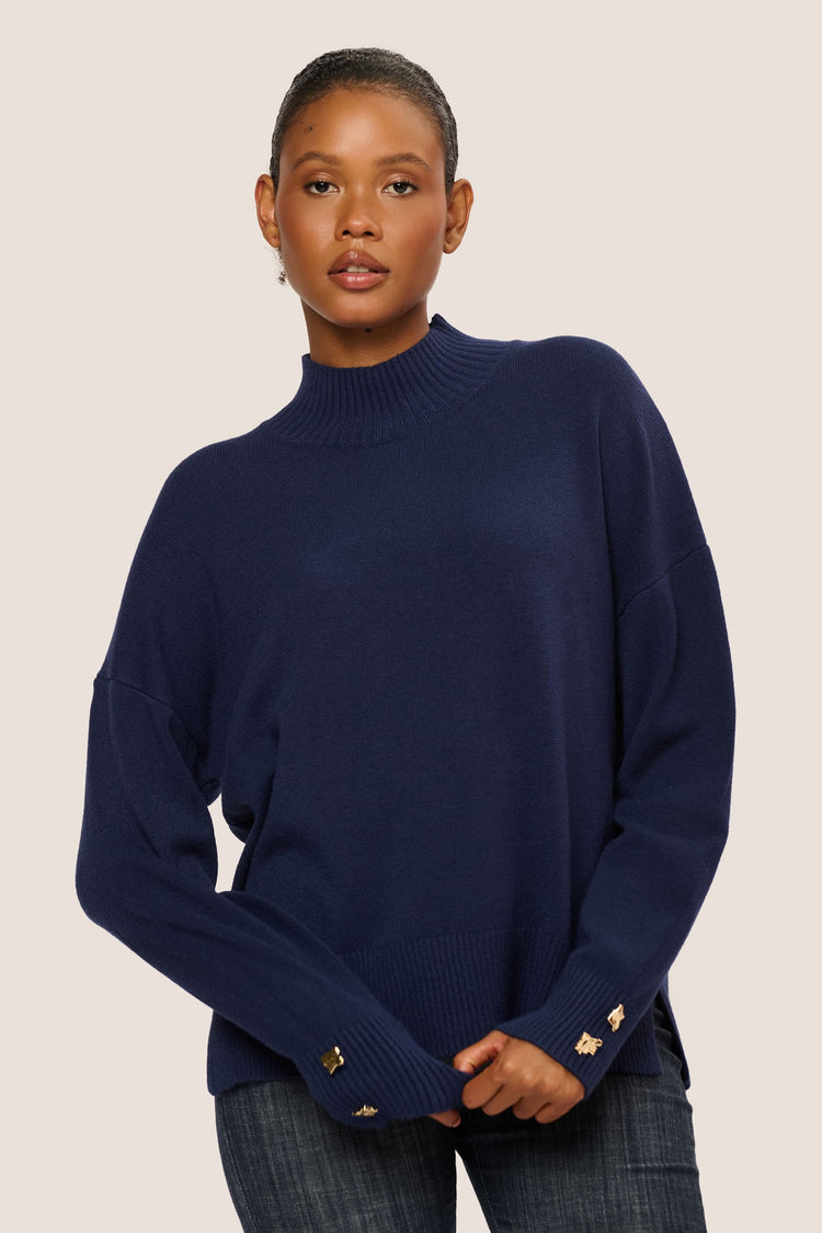 Lupetto con bottoni gioiello ai polsini