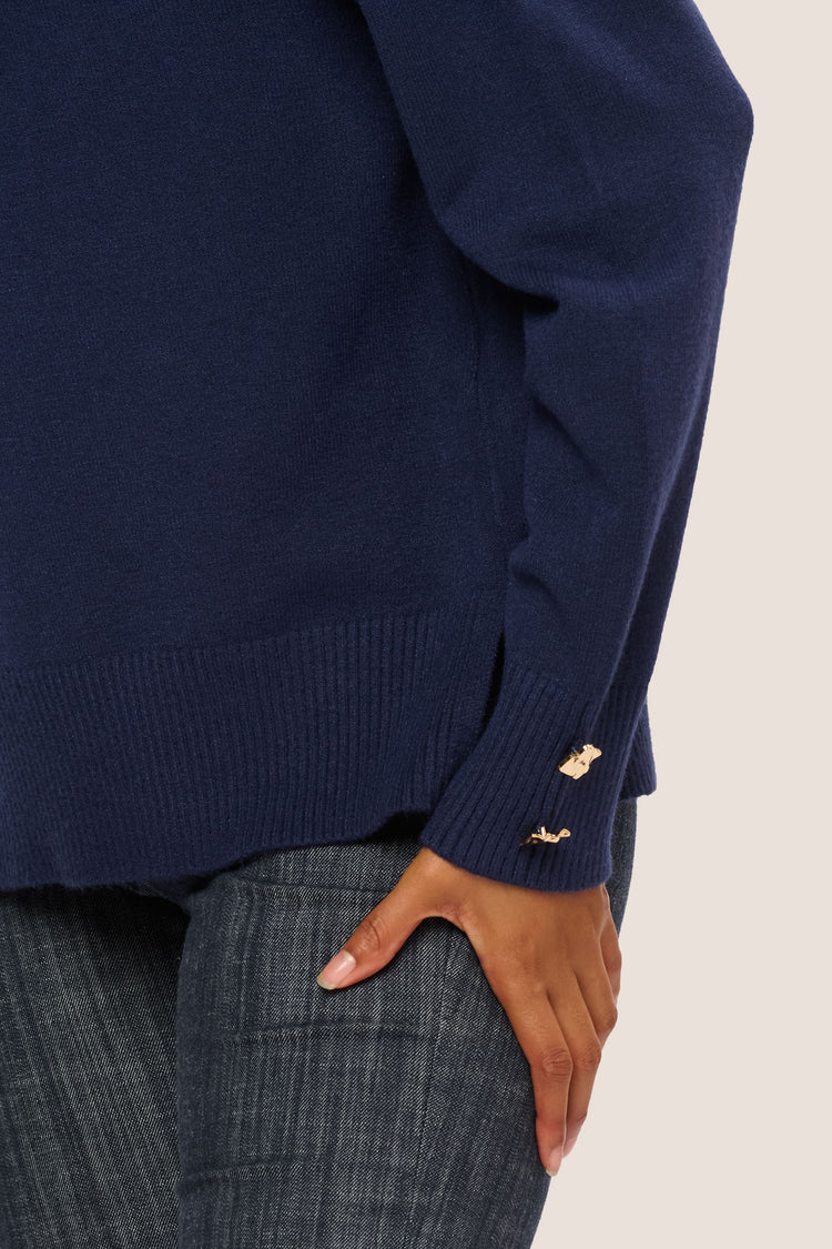 Lupetto con bottoni gioiello ai polsini