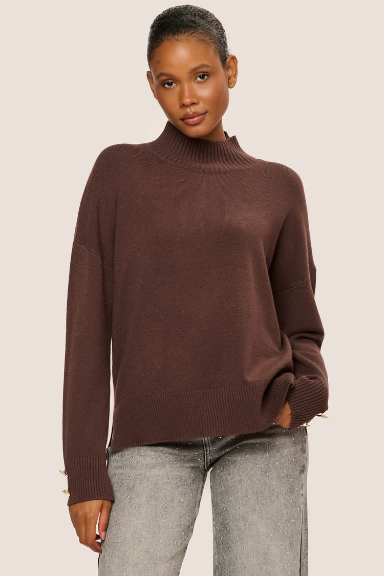 Lupetto con bottoni gioiello ai polsini