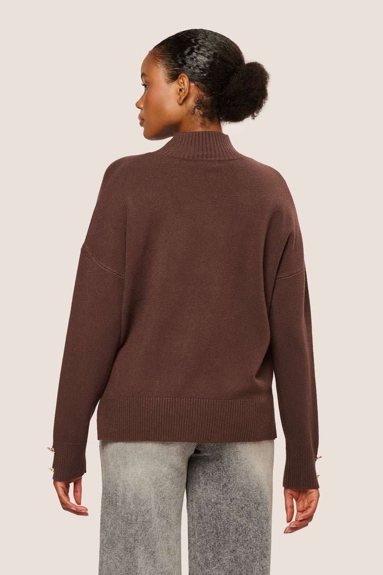 Lupetto con bottoni gioiello ai polsini