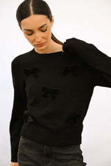 Pull con decorazione fiocchi