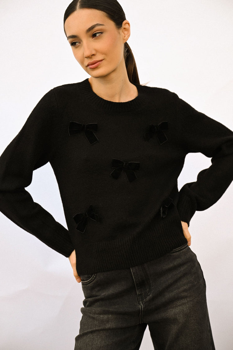 Pull con decorazione fiocchi