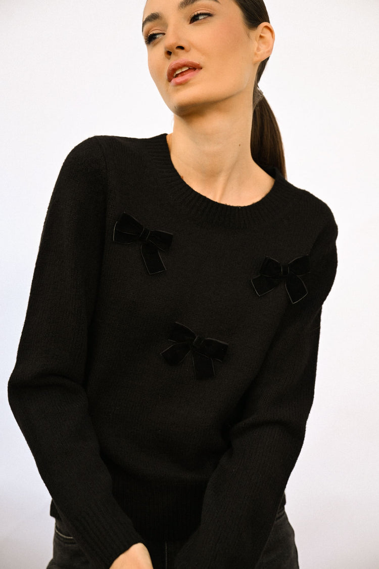 Pull con decorazione fiocchi