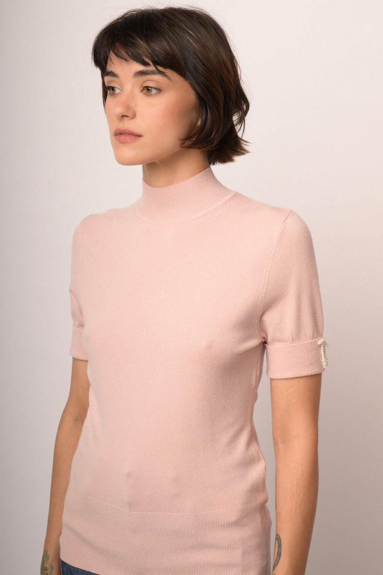 Maglia con fiocco perline manica