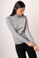 Maglia dolcevita con bottoni lurex