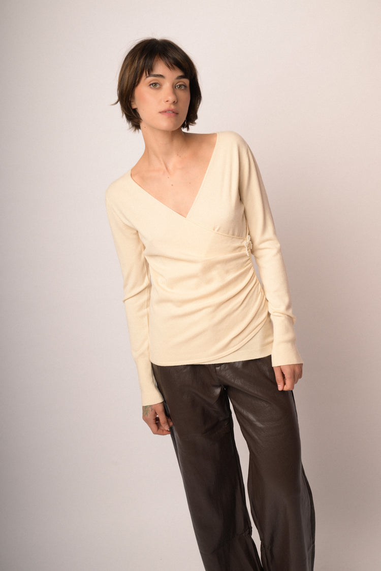 Maglia incrocio con fiocchi perline