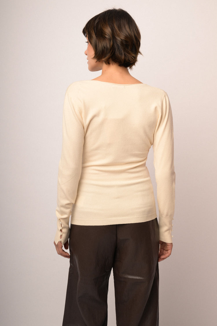 Maglia incrocio con fiocchi perline