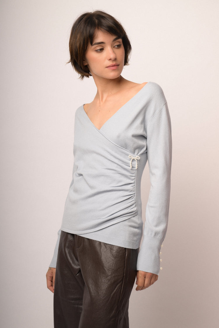 Maglia incrocio con fiocchi perline