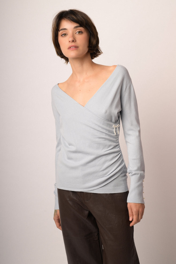 Maglia incrocio con fiocchi perline