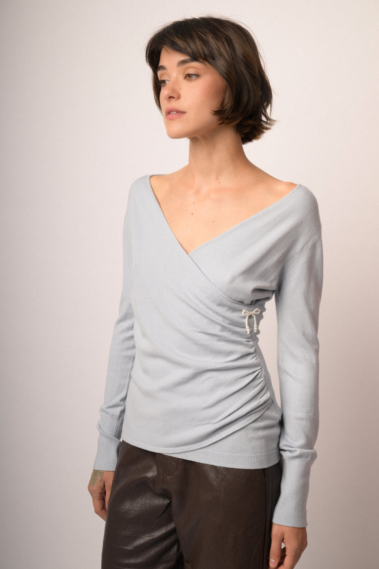 Maglia incrocio con fiocchi perline