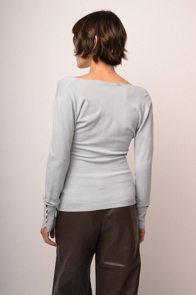 Maglia incrocio con fiocchi perline