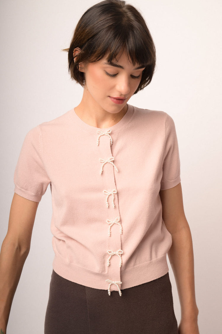 Cardigan rosa a maniche corte con fiocchi di perline