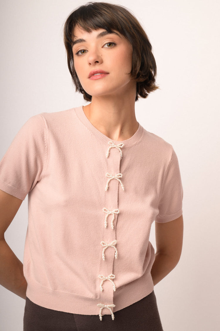 Cardigan rosa a maniche corte con fiocchi di perline