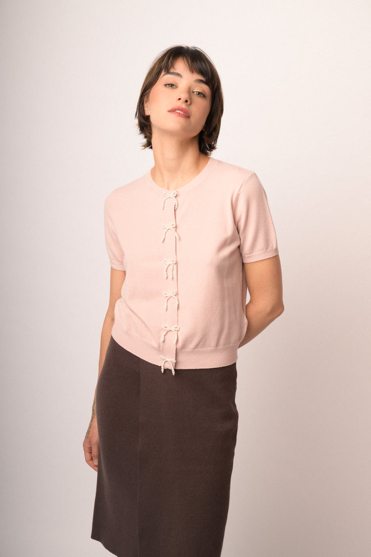 Cardigan rosa a maniche corte con fiocchi di perline