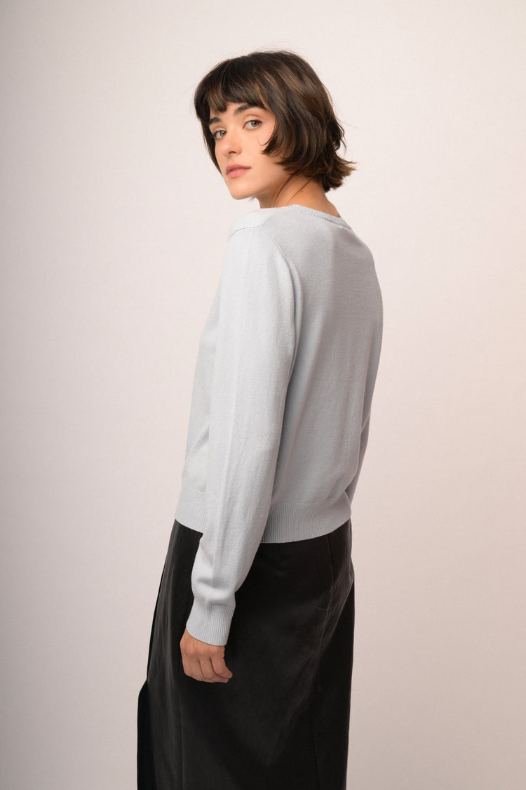 Cardigan rosa a maniche corte con fiocchi di perline