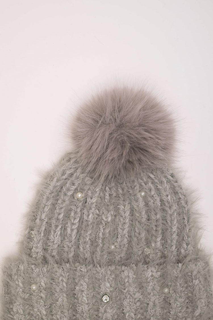 Berretto con strass e pompon