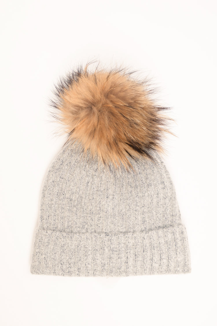 Cappello a coste con pon pon grigio