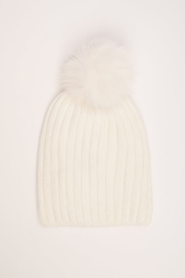 Cappello a coste con pon pon avorio