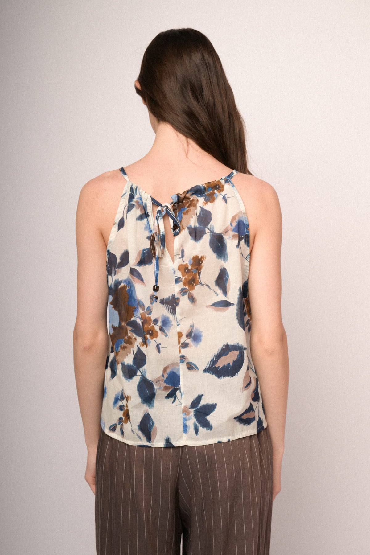 Top america con laccio fantasia fiore