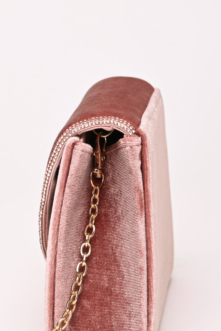 Pochette in velluto con profilo con strass