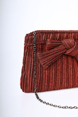 Pochette in plissé lamé con fiocco