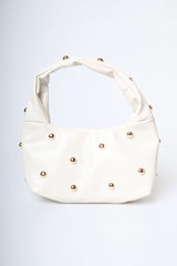 Borsa piccola a mezzaluna con borchie