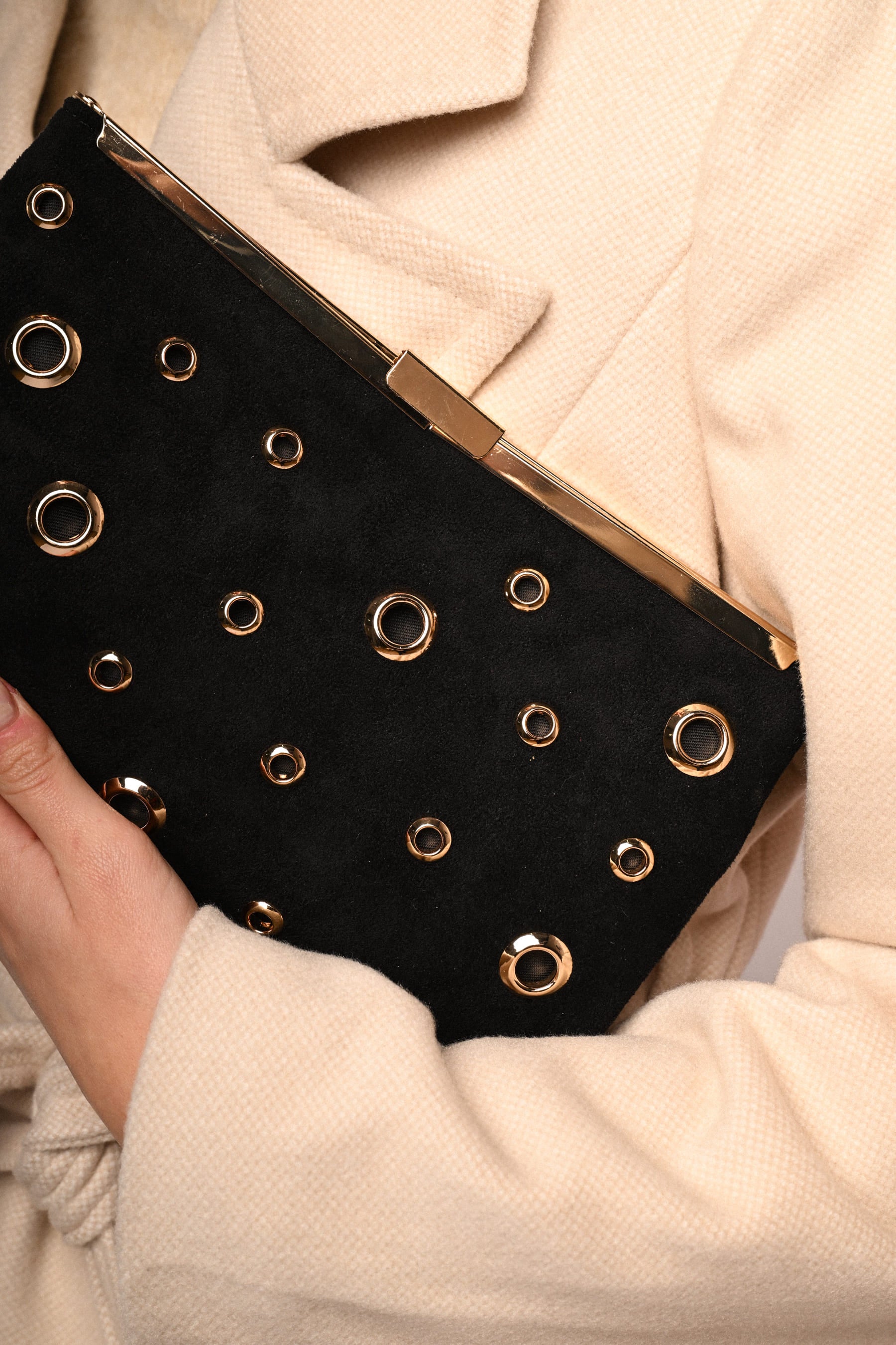 Pochette con decorazione borchie