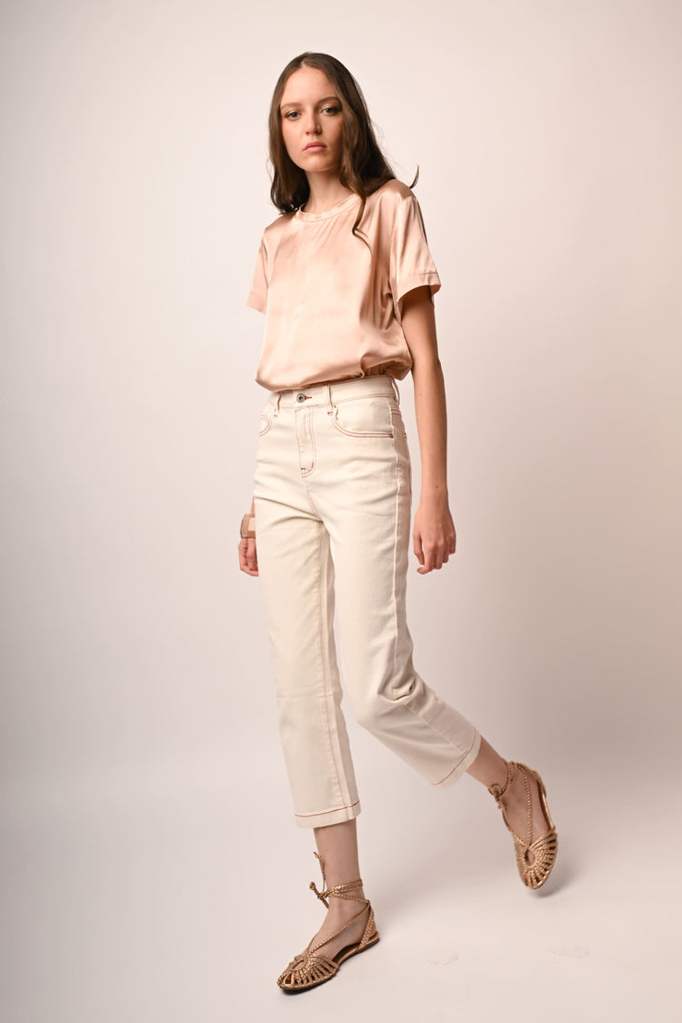 Jeans con impunture a contrasto