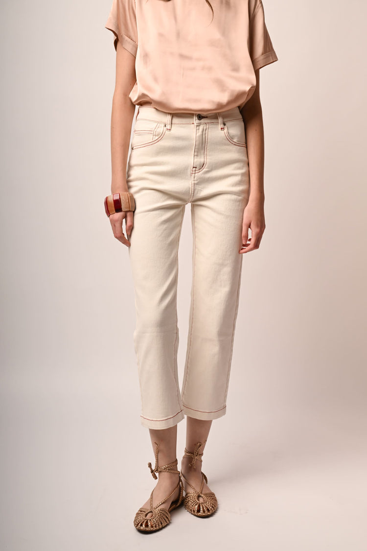 Jeans con impunture a contrasto