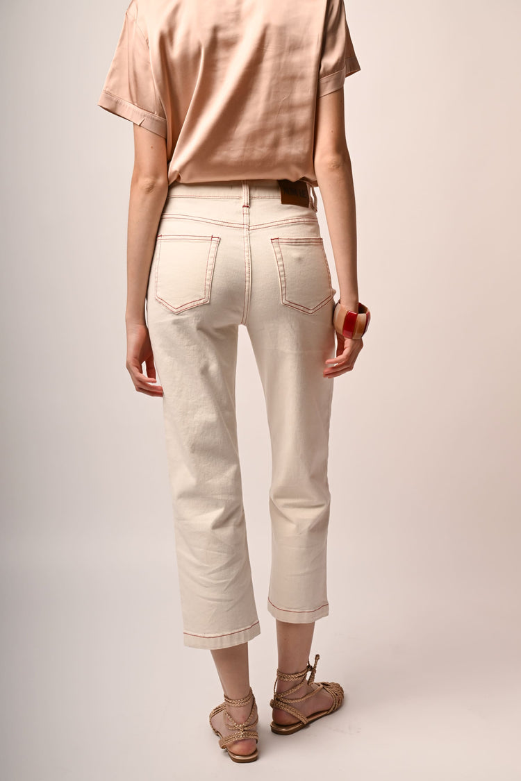 Jeans con impunture a contrasto