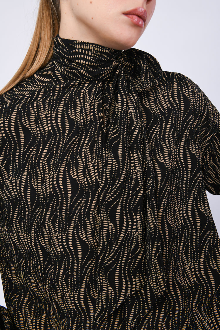 Blusa con stampa e fiocco