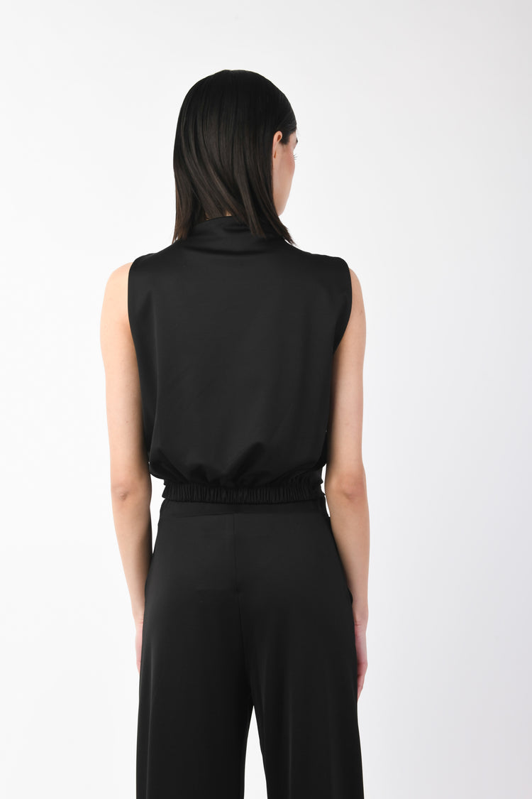 Top smanicato e drappeggiato