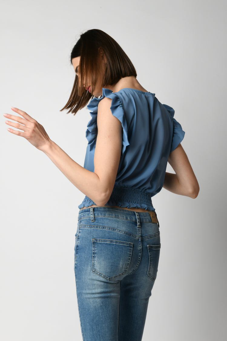 Top crop a punto smock con rouches
