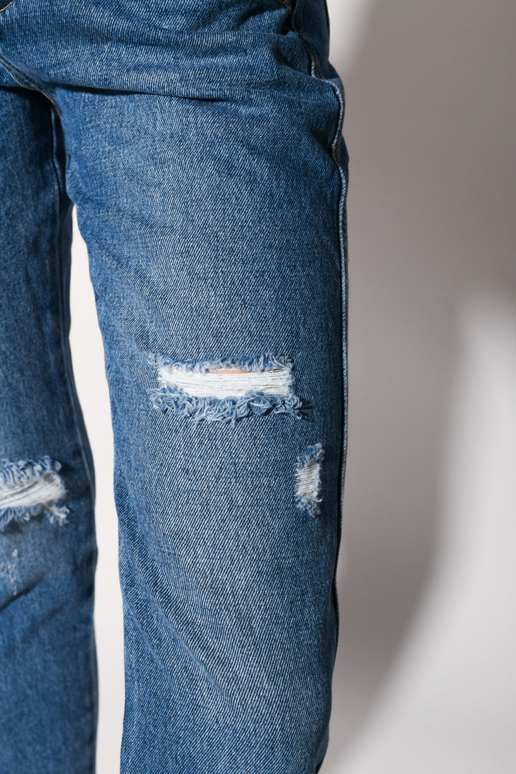 Jeans crop con strappi